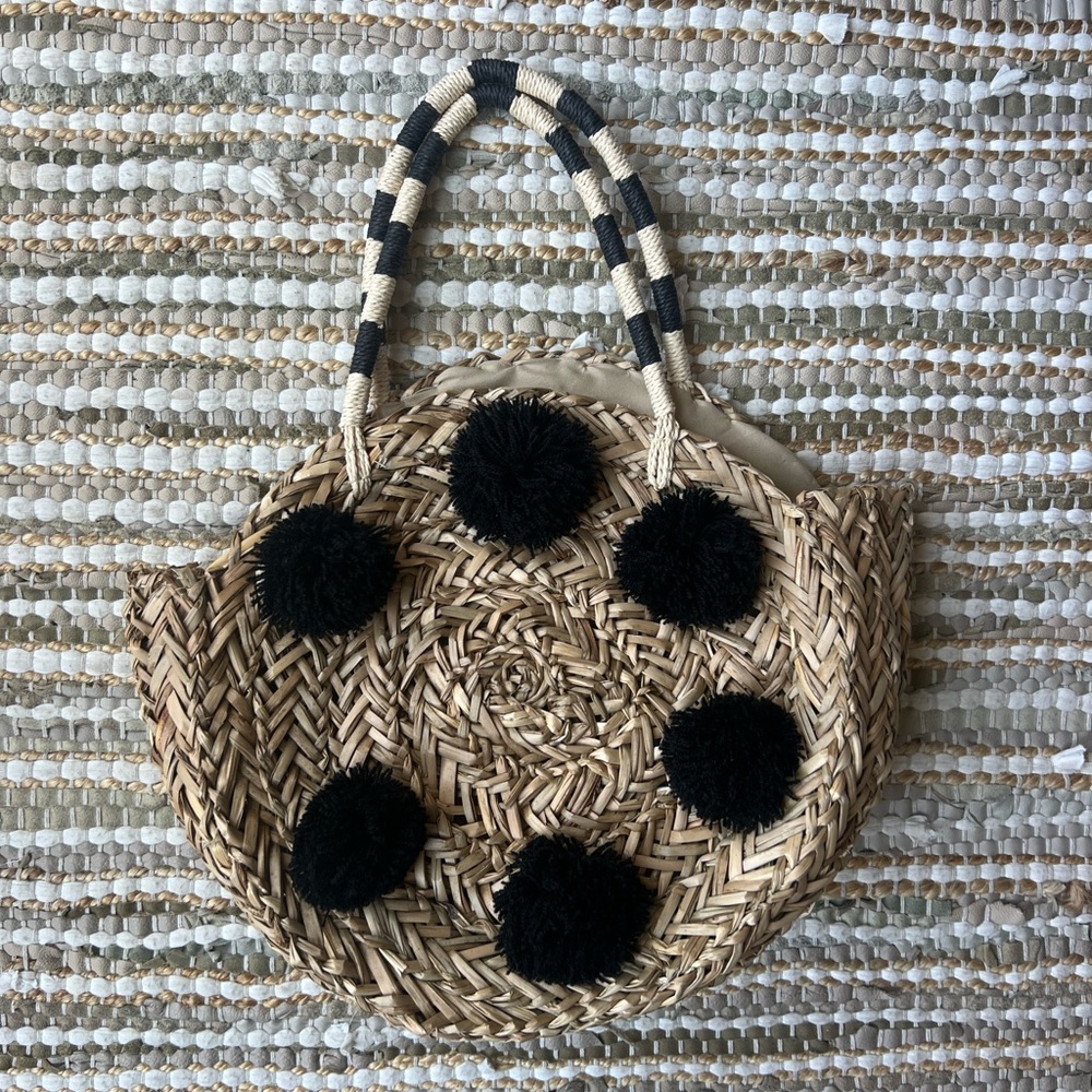 Black Pom-Pom Straw Tote Bag